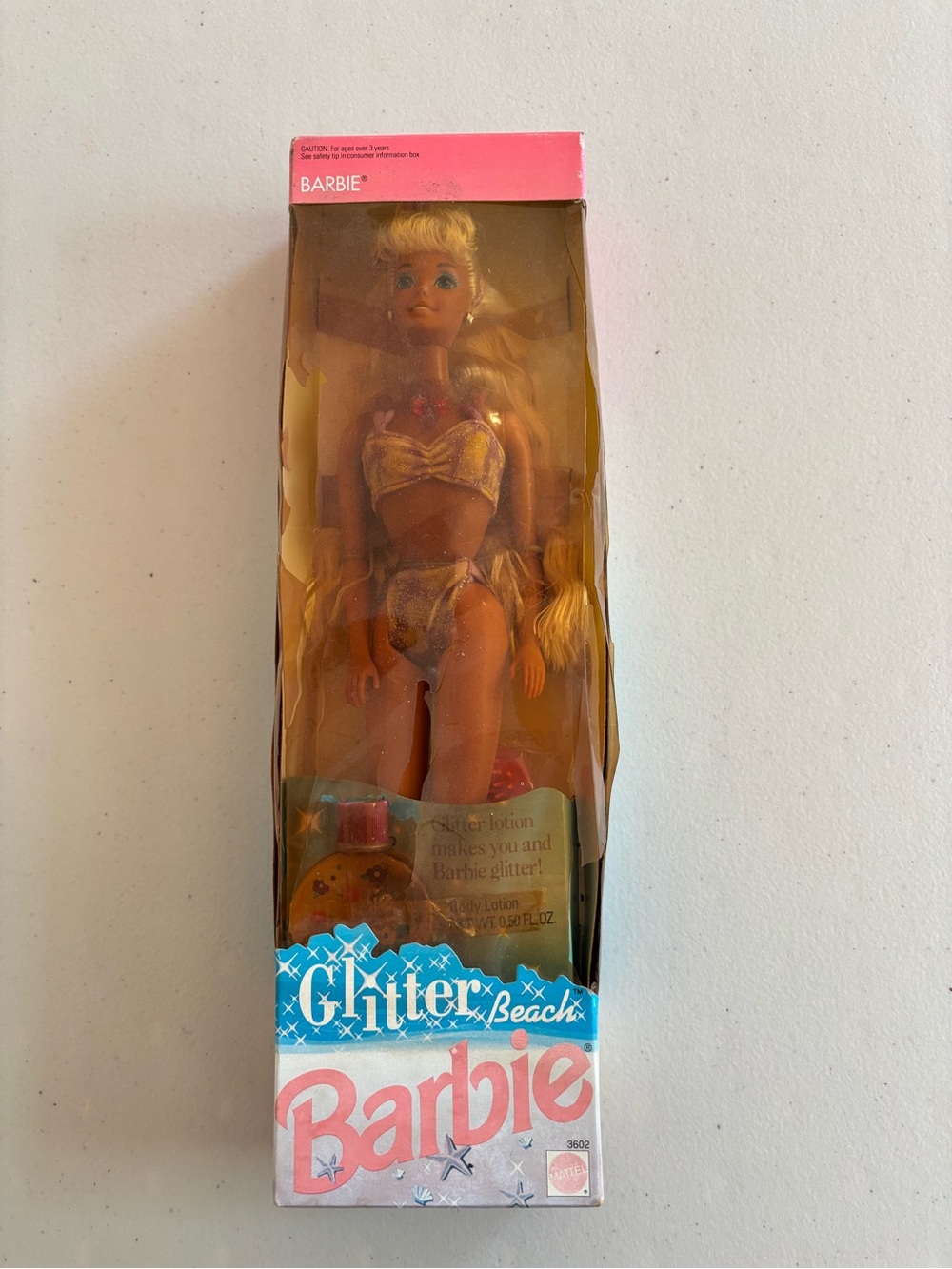 Barbie Pink and Gold Beach Glitter Doll